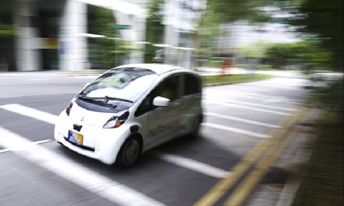 Singapore launches world`s first `self-driving` taxi service 